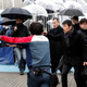 An official directs participants during an anti-missile evacuation drill at the Tokyo Dome City amusement park in Tokyo, Japan on Jan. 22.